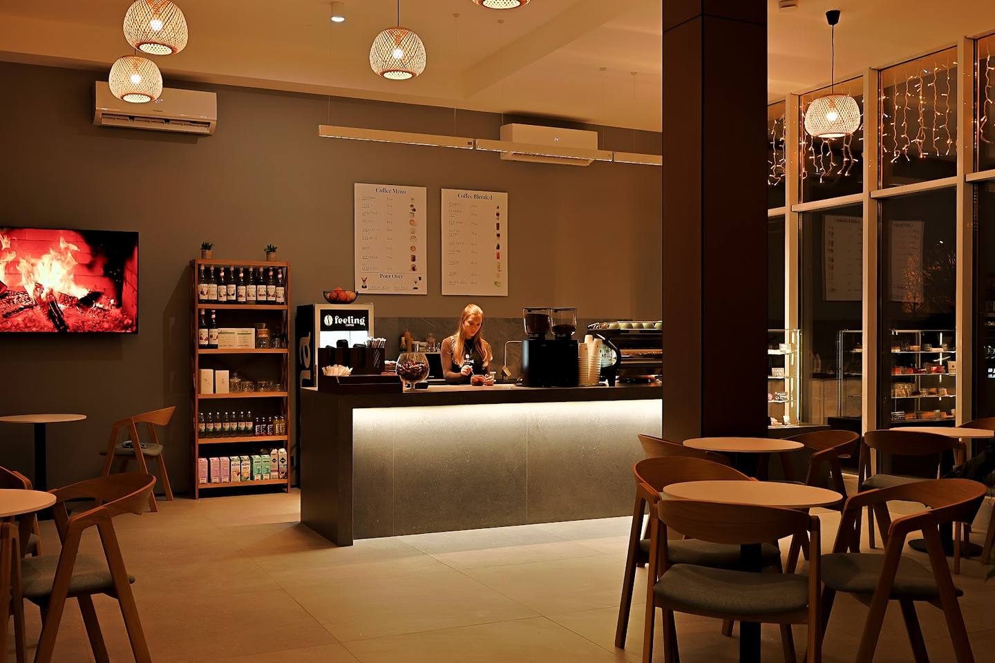 Modern wine bar interior with counter, seating area, and ambient lighting