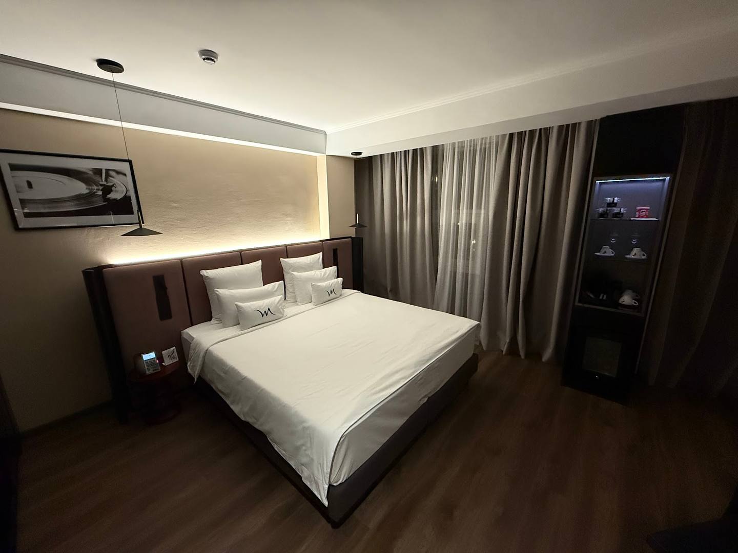 Modern hotel bedroom with contemporary design and ambient lighting