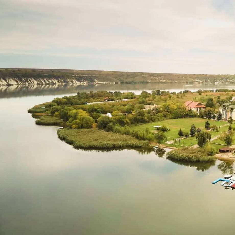 Aerial view of Dniester River valley with rolling hills and riverside settlements