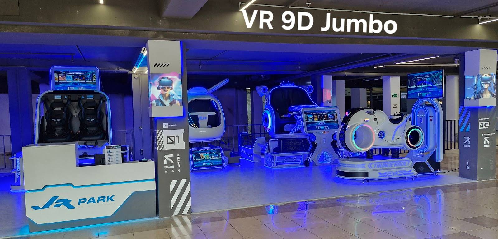 VR 9D Jumbo entertainment space with immersive gaming stations and blue-lit interactive displays