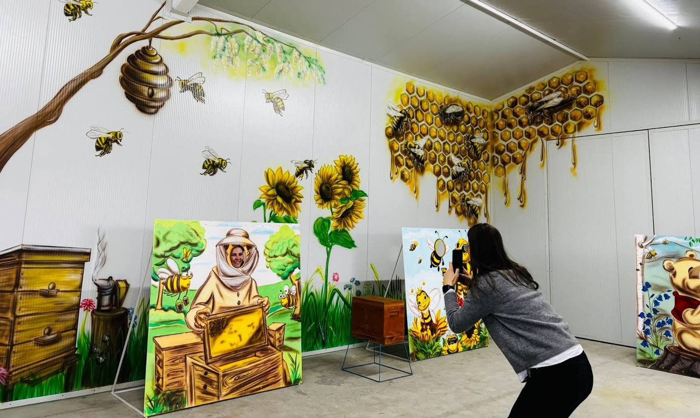 Interactive photo installation room with props and themed backdrops for photo experiences