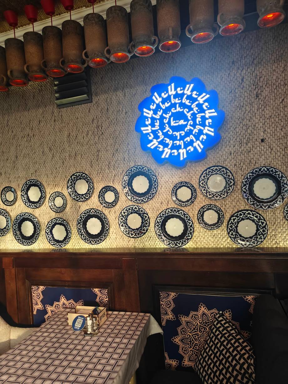 Display of decorative ceramics and traditional crafts in a shop interior