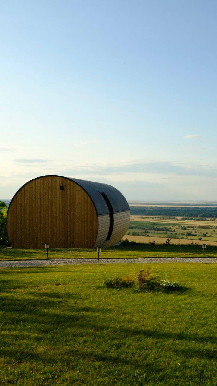 Barrel sauna with panoramic countryside landscape view in Moldova
