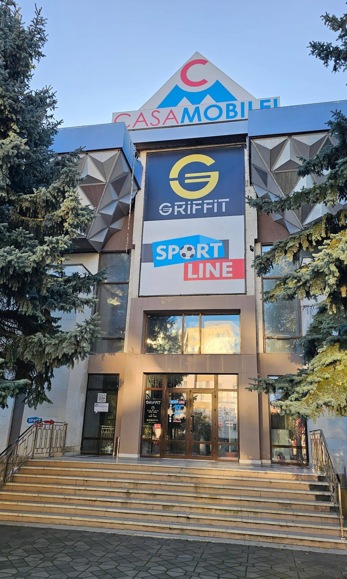 Casamobil storefront with Griffit and Sport Line signage, modern façade with glass entrance