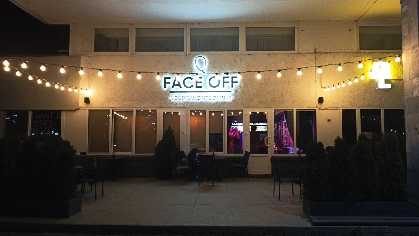 Face Off nightclub interior with dance floor, stage lighting, and branded signage