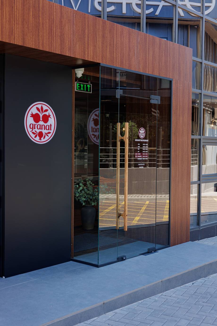 Grandi wine bar storefront with modern façade and branded entrance