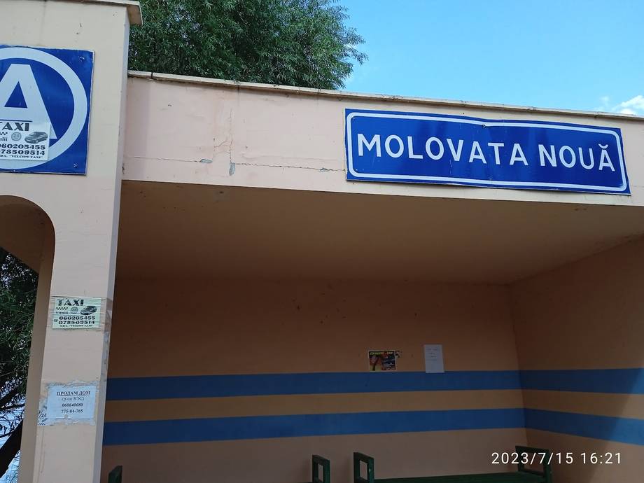 Molovata Noua storefront with blue signage and entrance