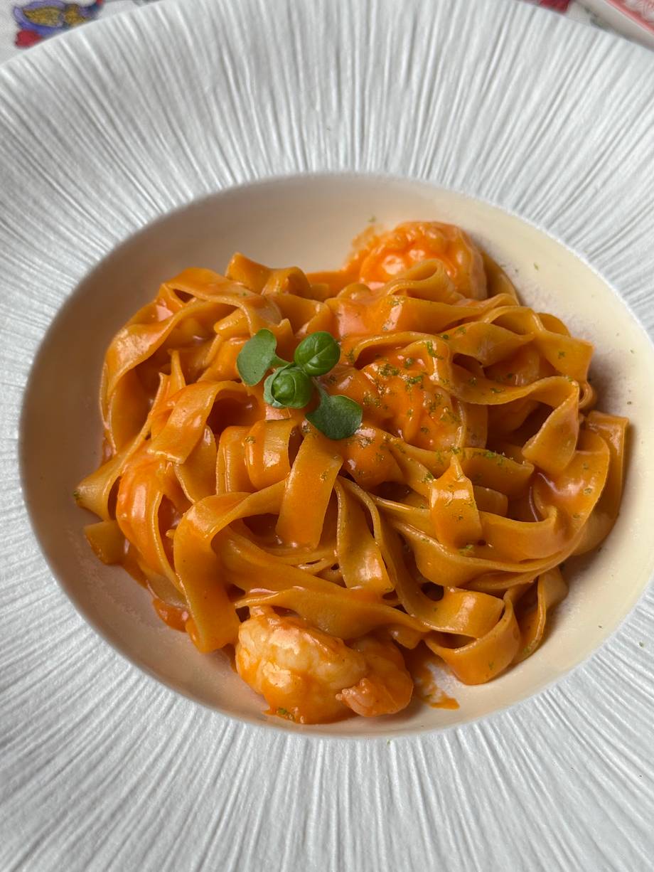 Tagliatelle pasta with creamy tomato sauce and shrimp