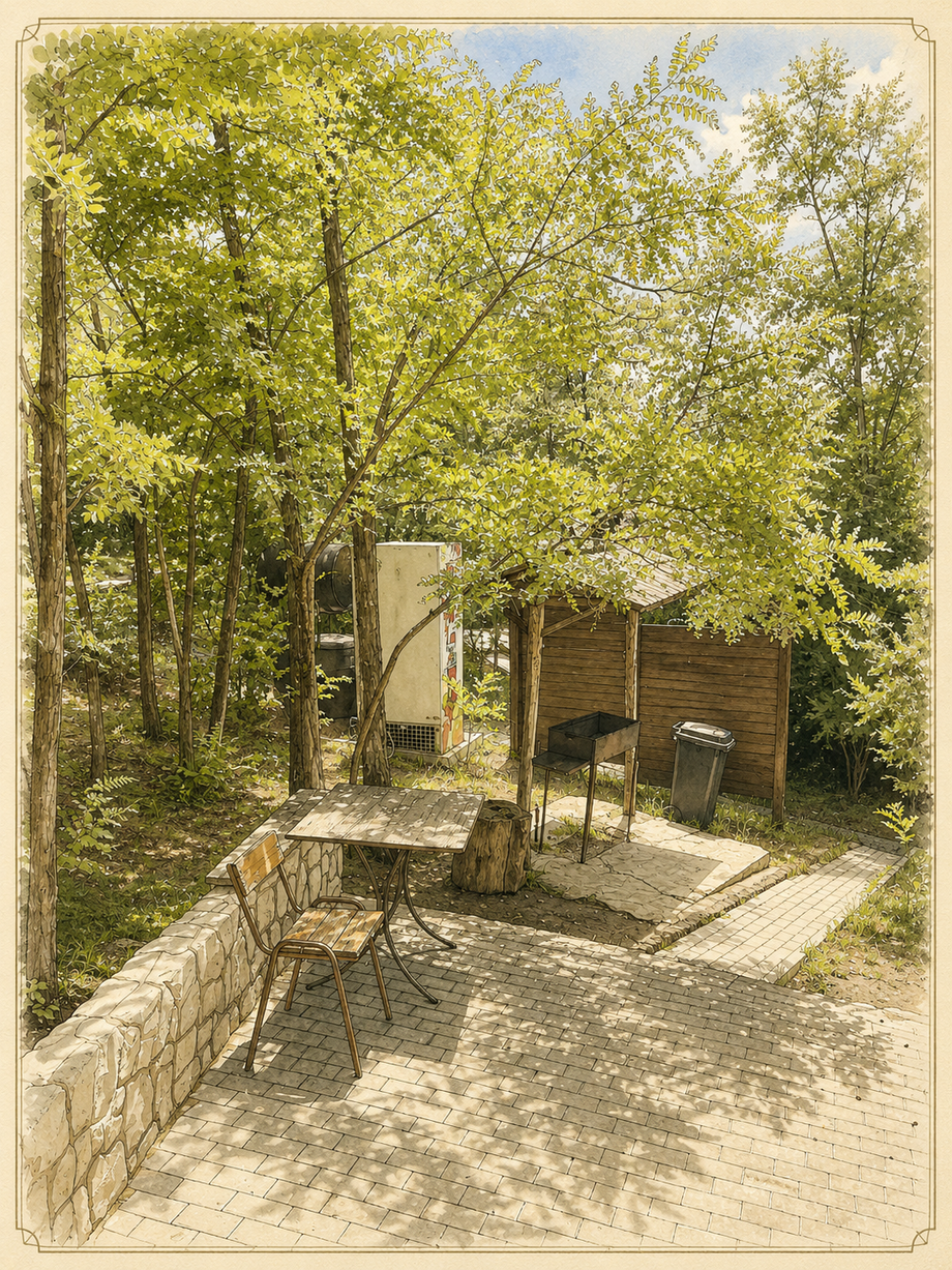 Outdoor terrace seating area nestled among green trees and wooden structures