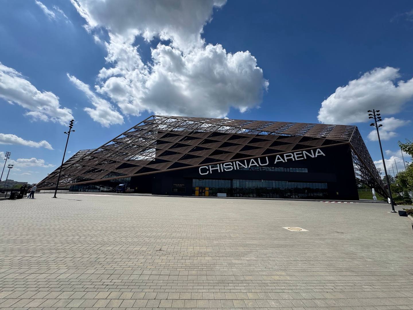 Chişinău Arena modern sports and events venue exterior with distinctive metallic canopy
