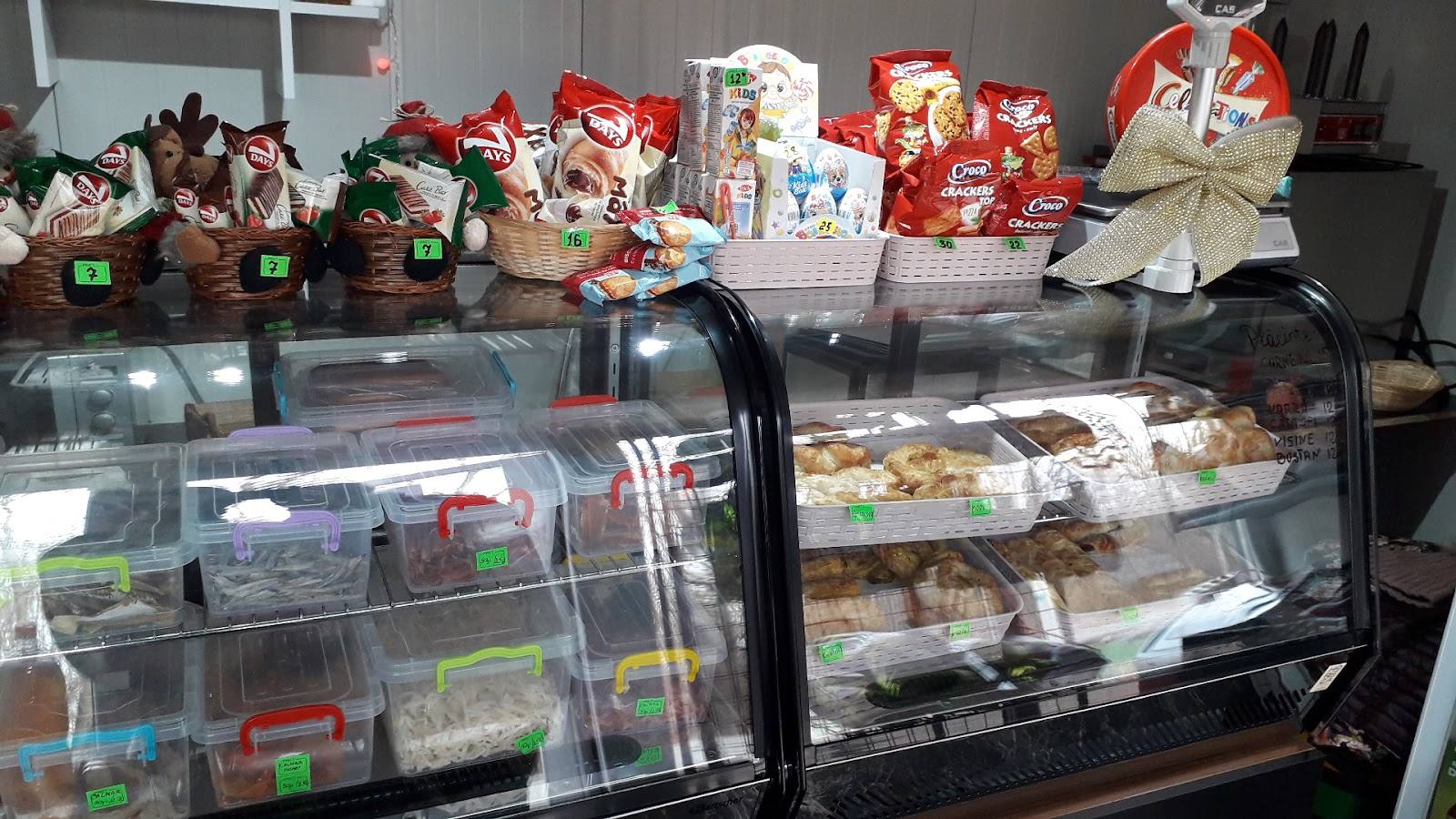 Pastry and dessert display counter with cakes and confections