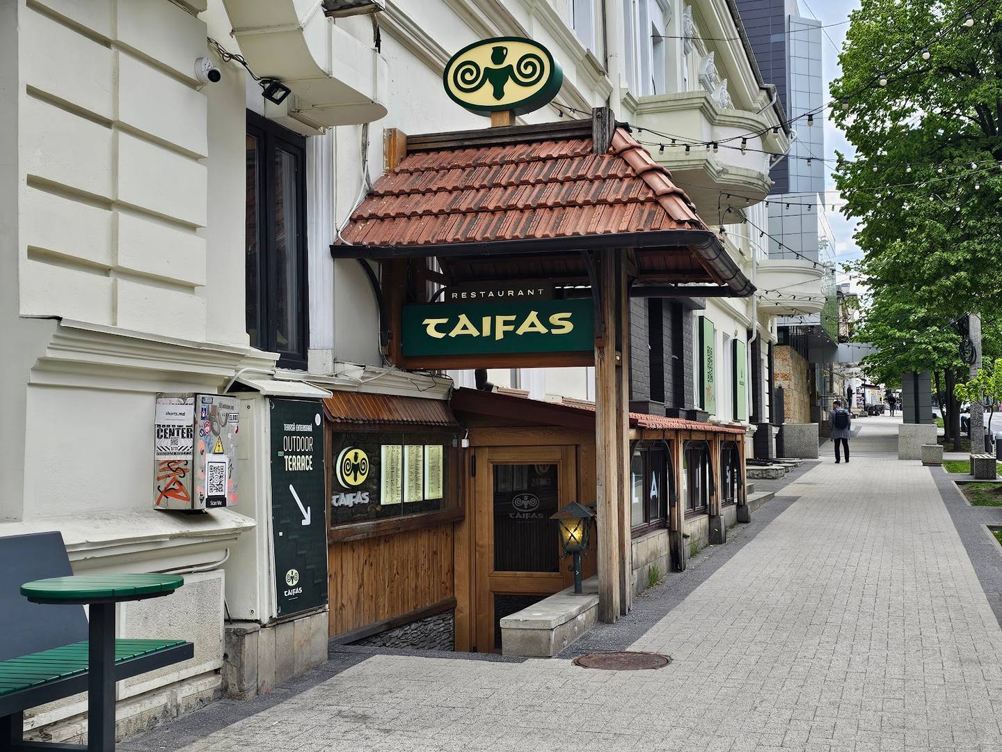 Caifas wine bar storefront with distinctive clay roof and street-level entrance in downtown Chișinău