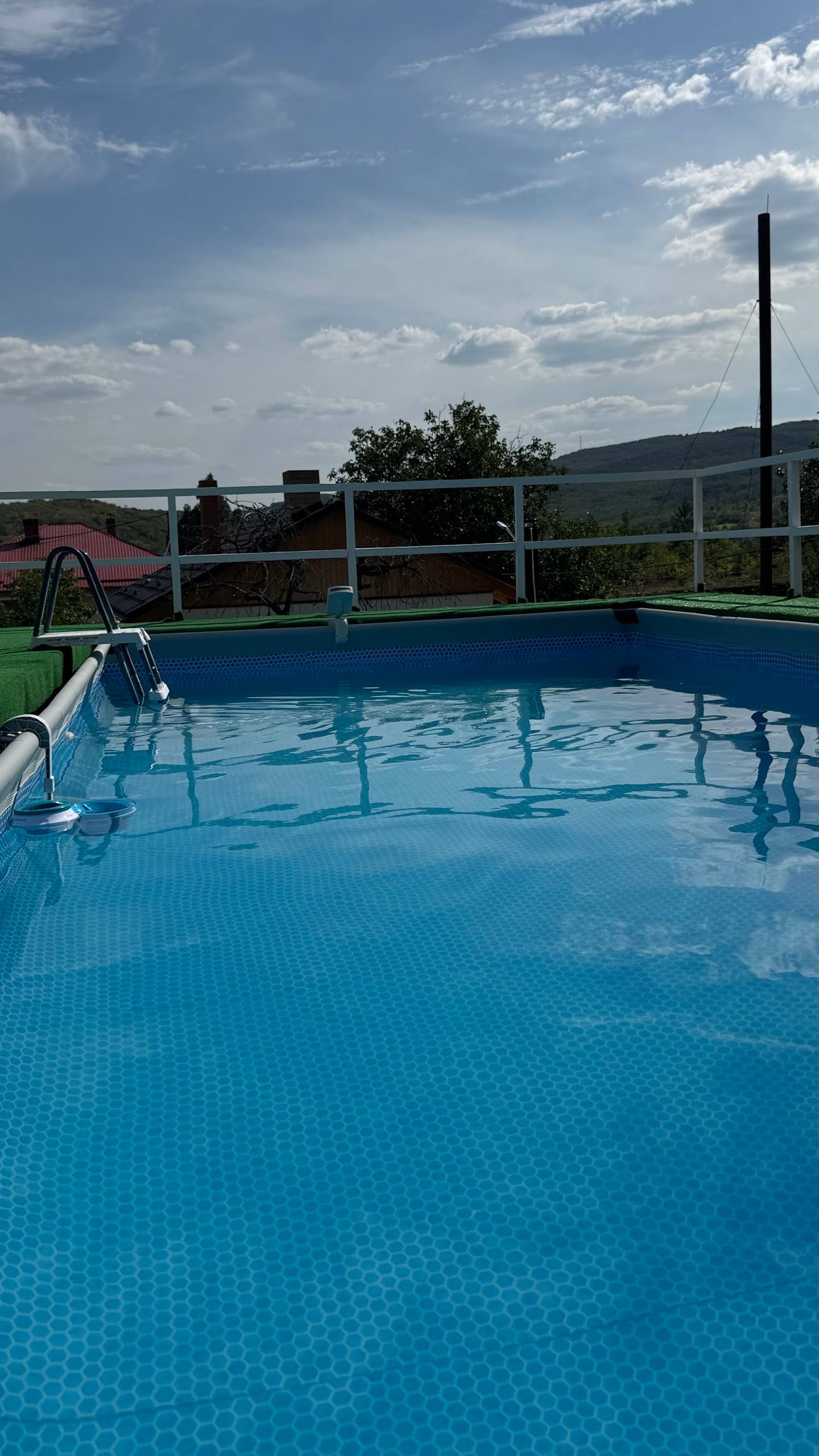 Outdoor pool with mountain views and countryside setting