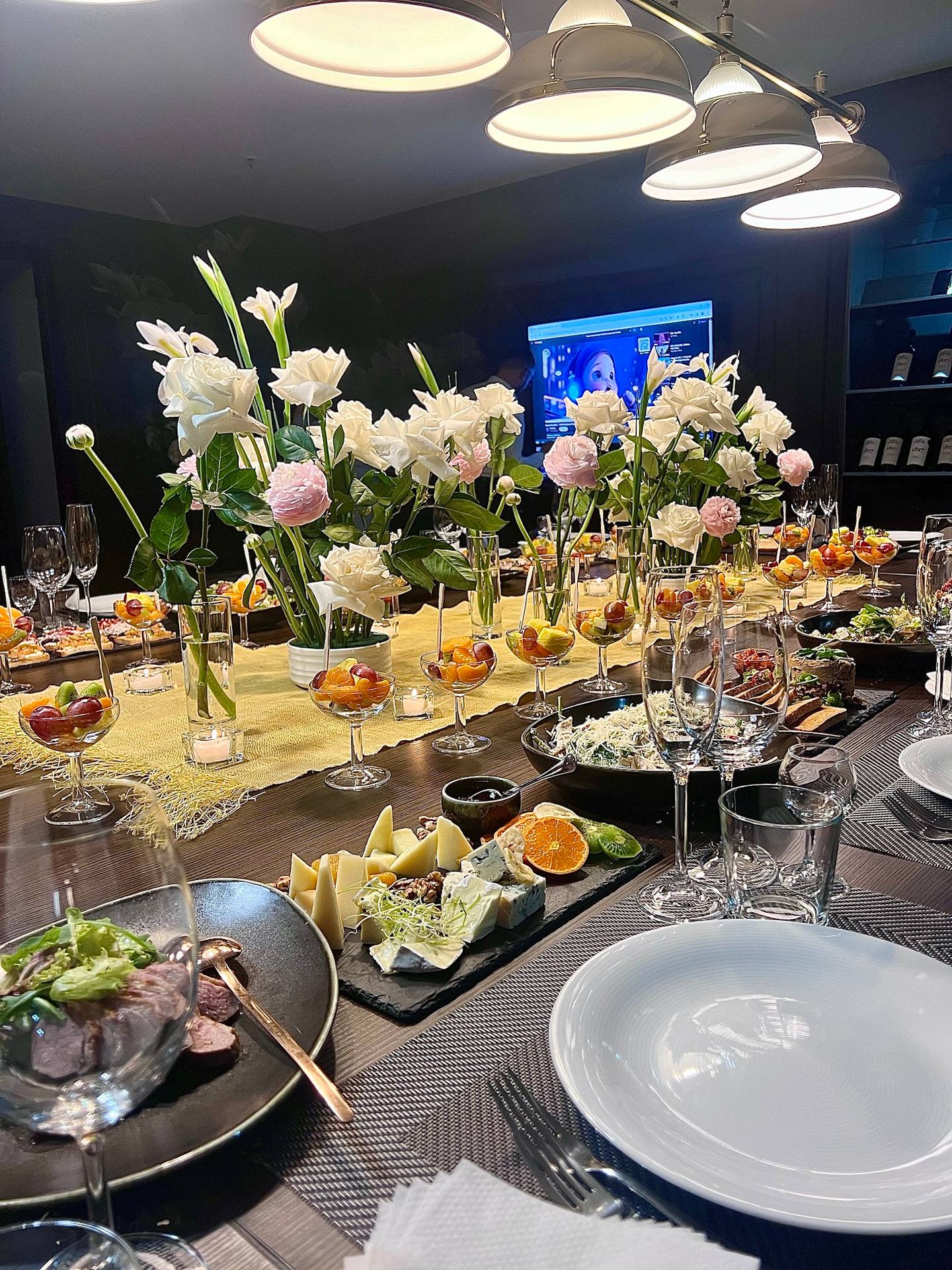 Elegantly decorated banquet table with floral centerpiece and place settings