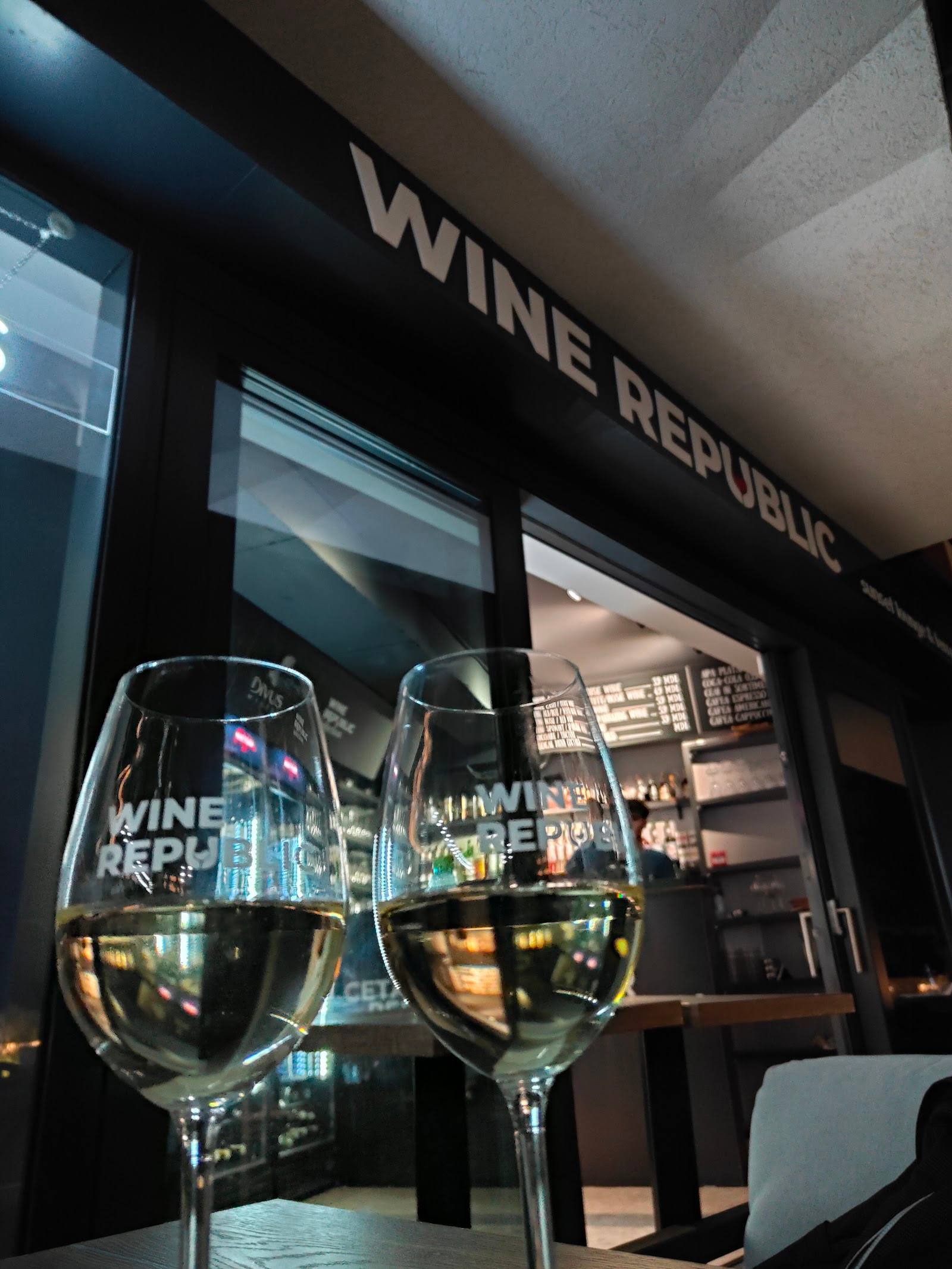 Wine Republic storefront with glasses at exterior display