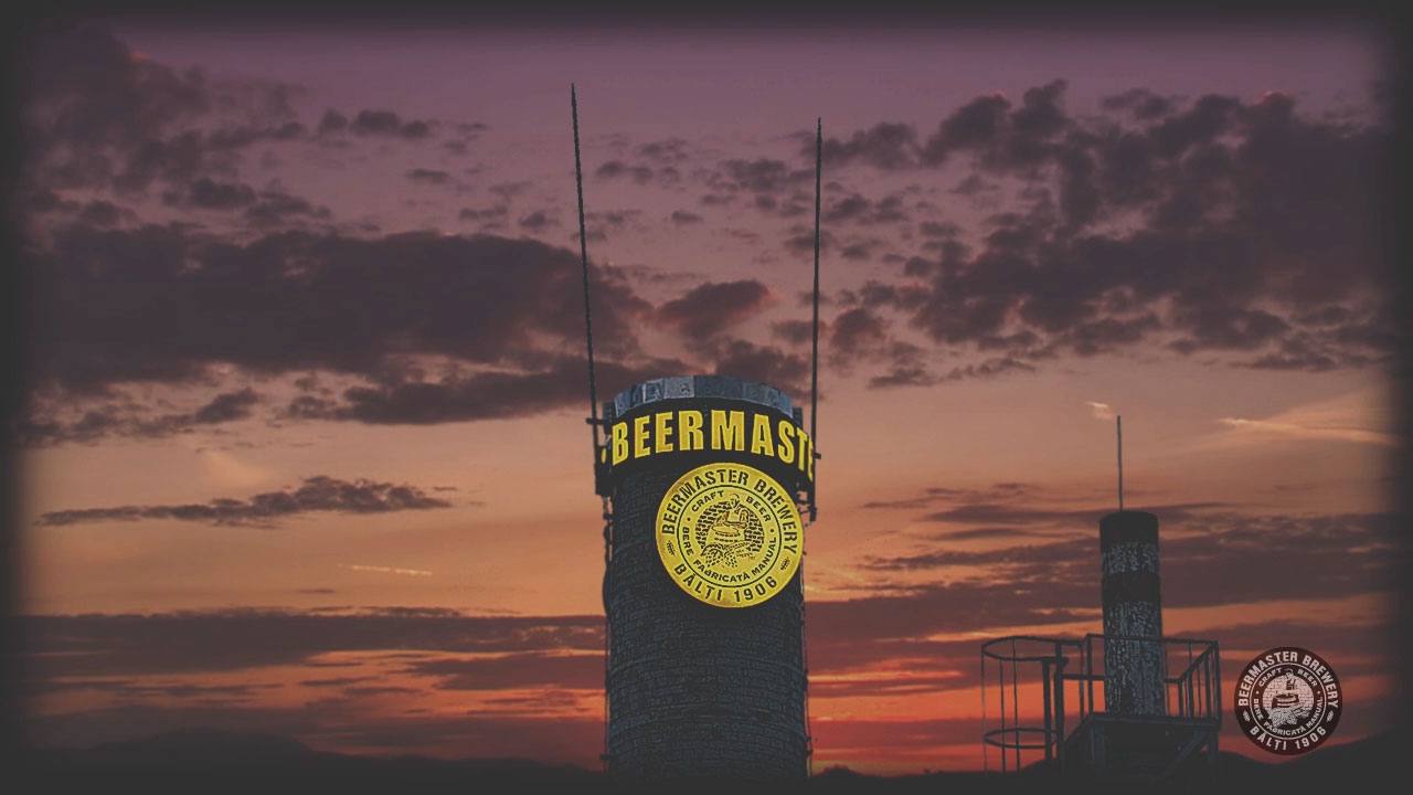 Iconic Beer Mash tower at golden hour with branding clearly visible