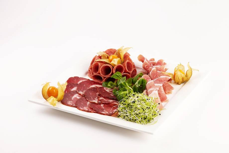 Charcuterie and cured meat platter arrangement