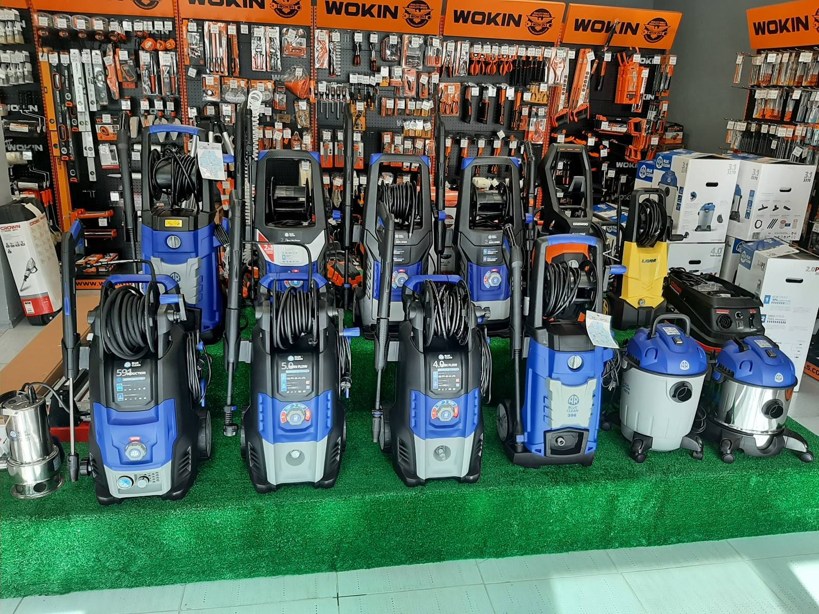 Wokin pressure washer showroom with equipment display and tools wall