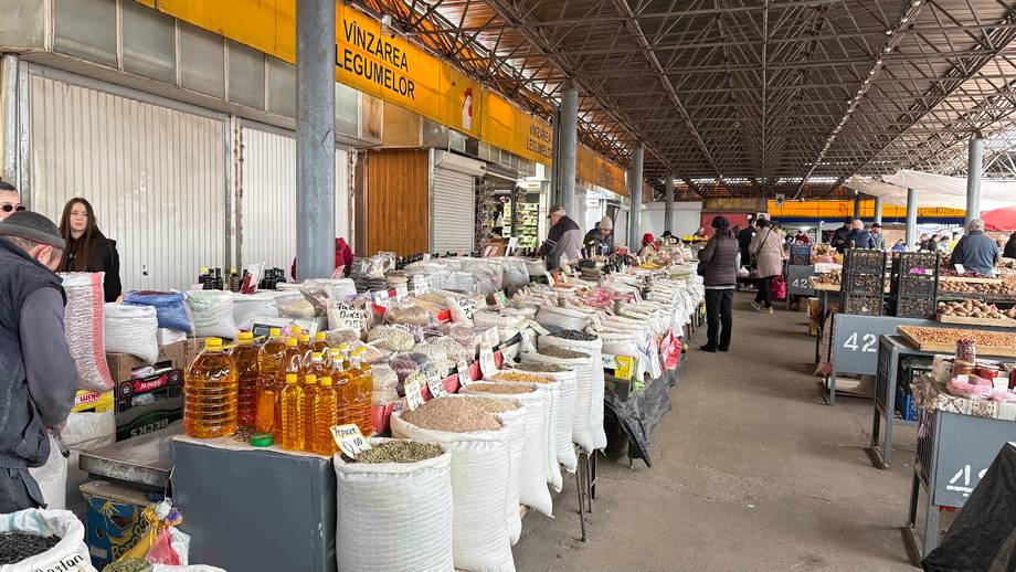 Farm market or farmers market hall with vendor stalls and local product displays