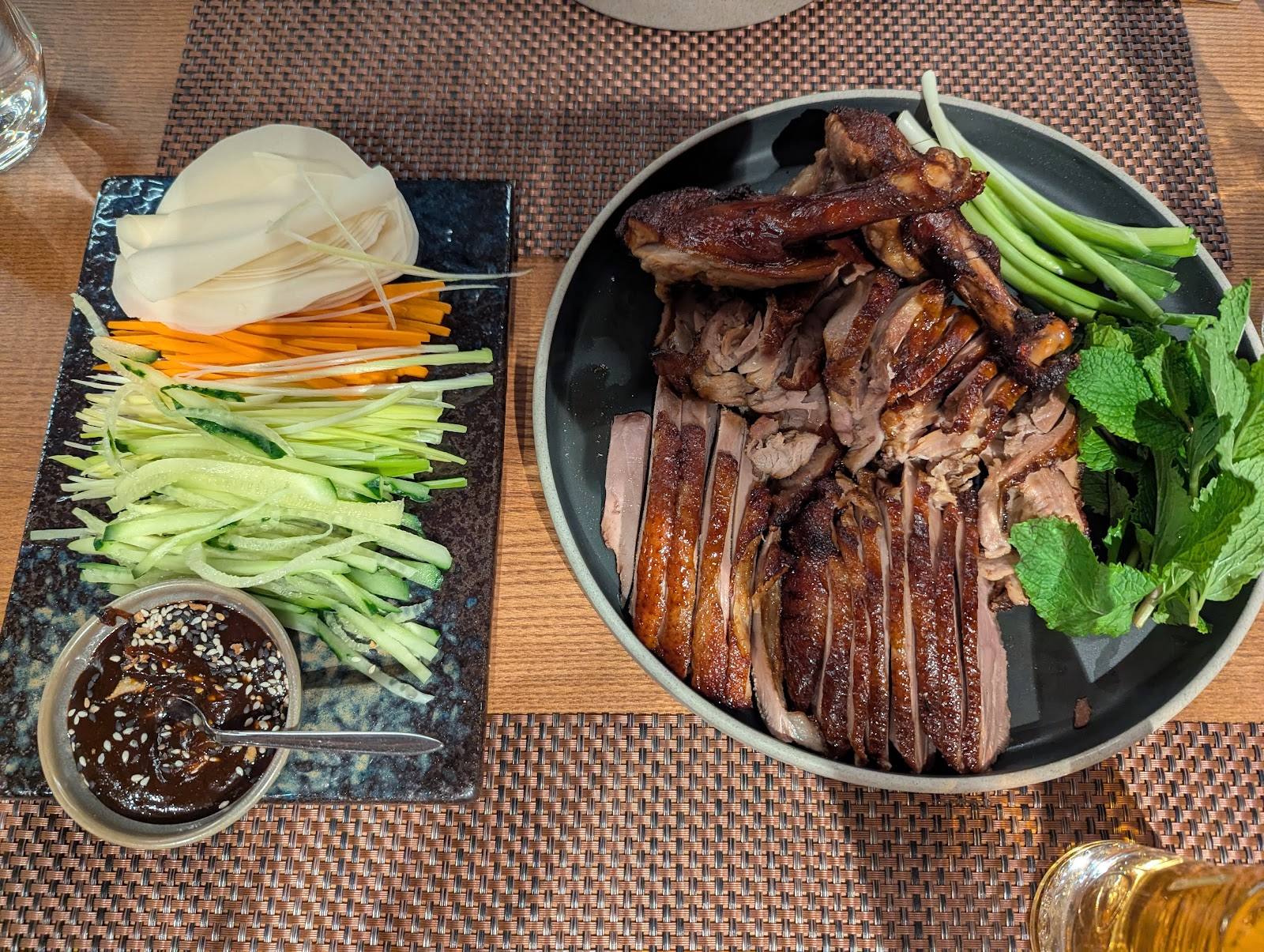 Plated Korean grilled meat with vegetables and side dishes