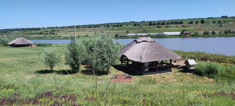 Glamping domes with lake view across Moldova countryside landscape