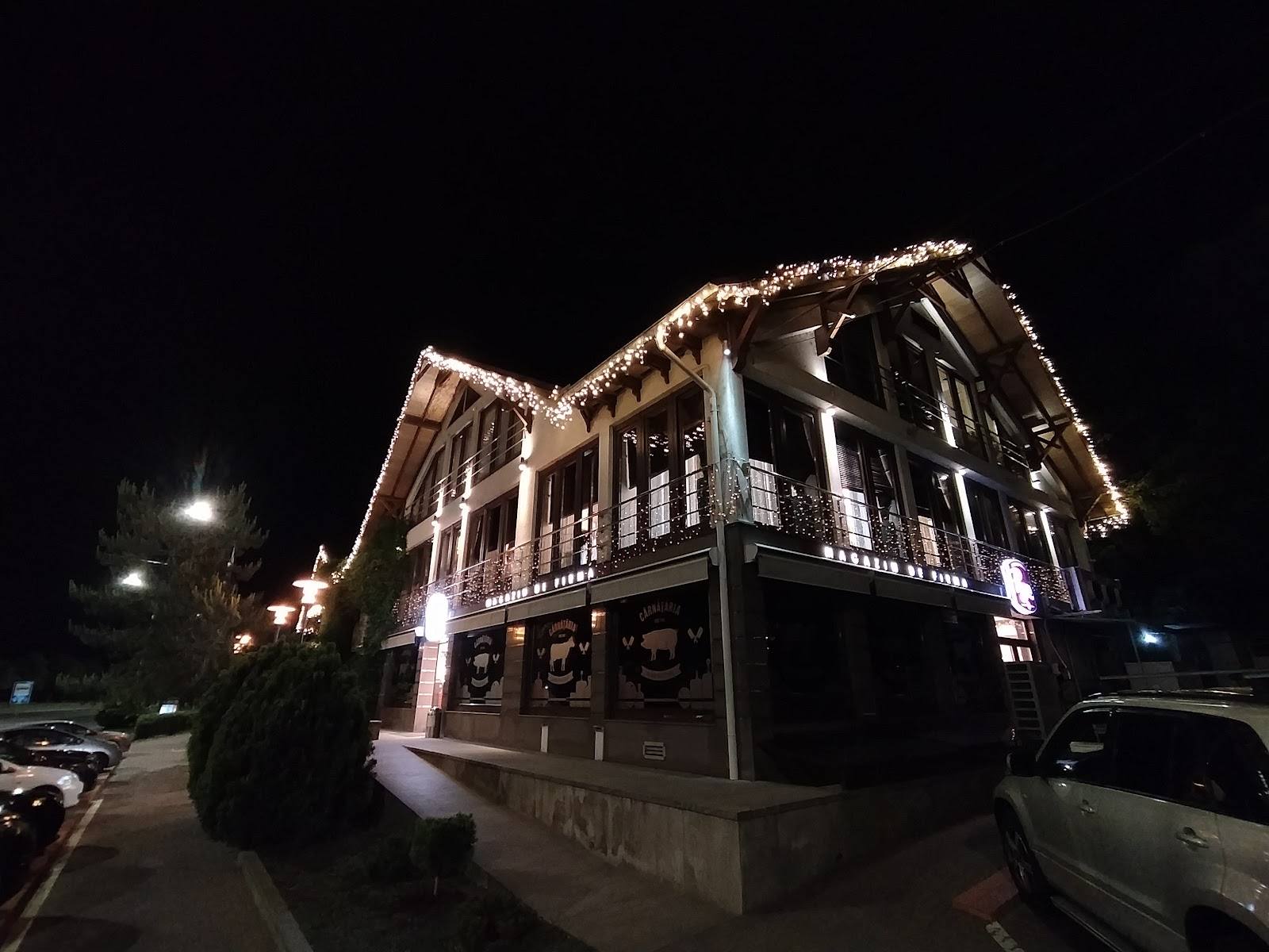 Historic building facade beautifully lit at night with distinctive architectural details