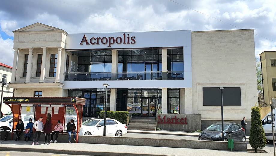 Acropolis venue storefront with distinctive neoclassical façade and signage