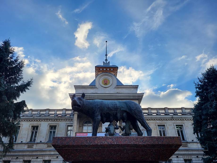 Iconic town hall building with clock tower and elephant sculpture monument