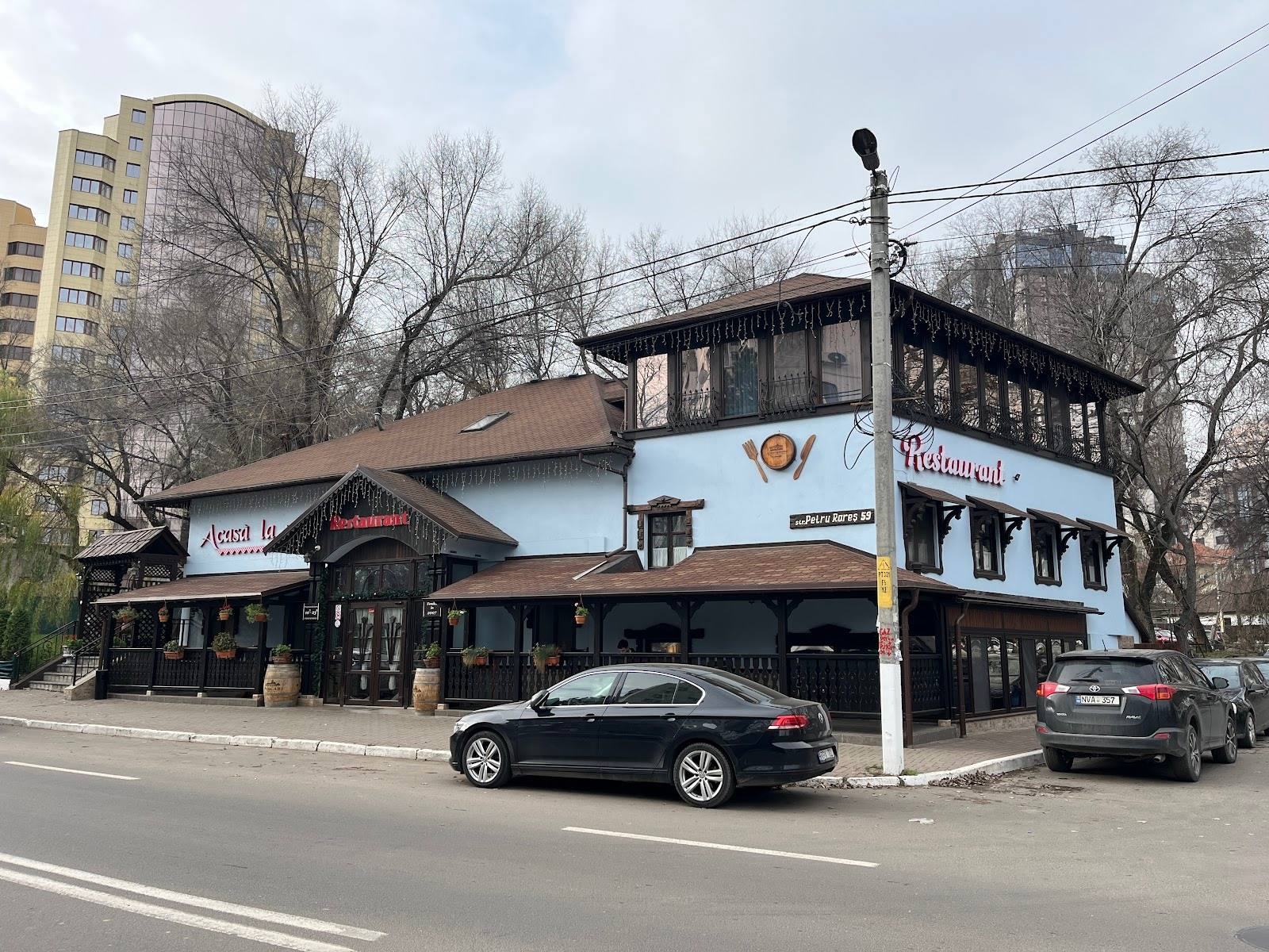 Storefront exterior with distinctive two-story architecture and street-facing entrance