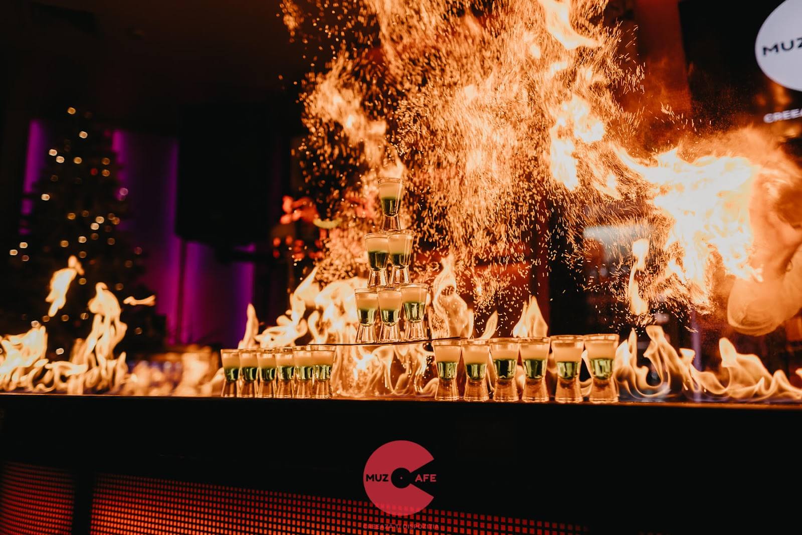Fire performance spectacle with pyrotechnics and flames during event