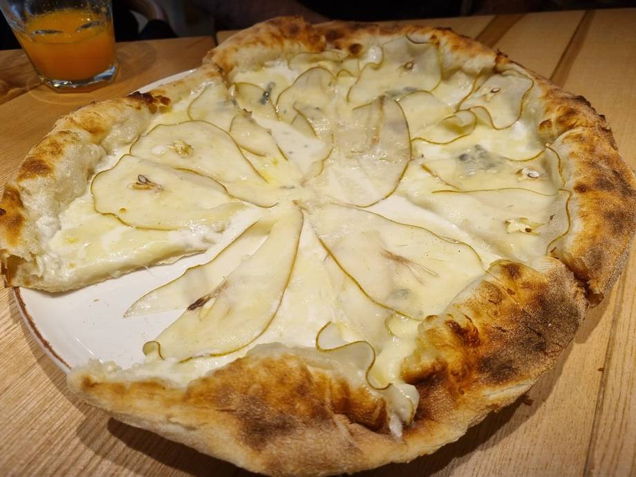 Pear and cheese pizza with charred crust