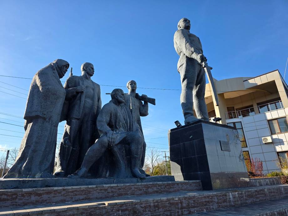 Soviet-era bronze statues and monuments in public plaza