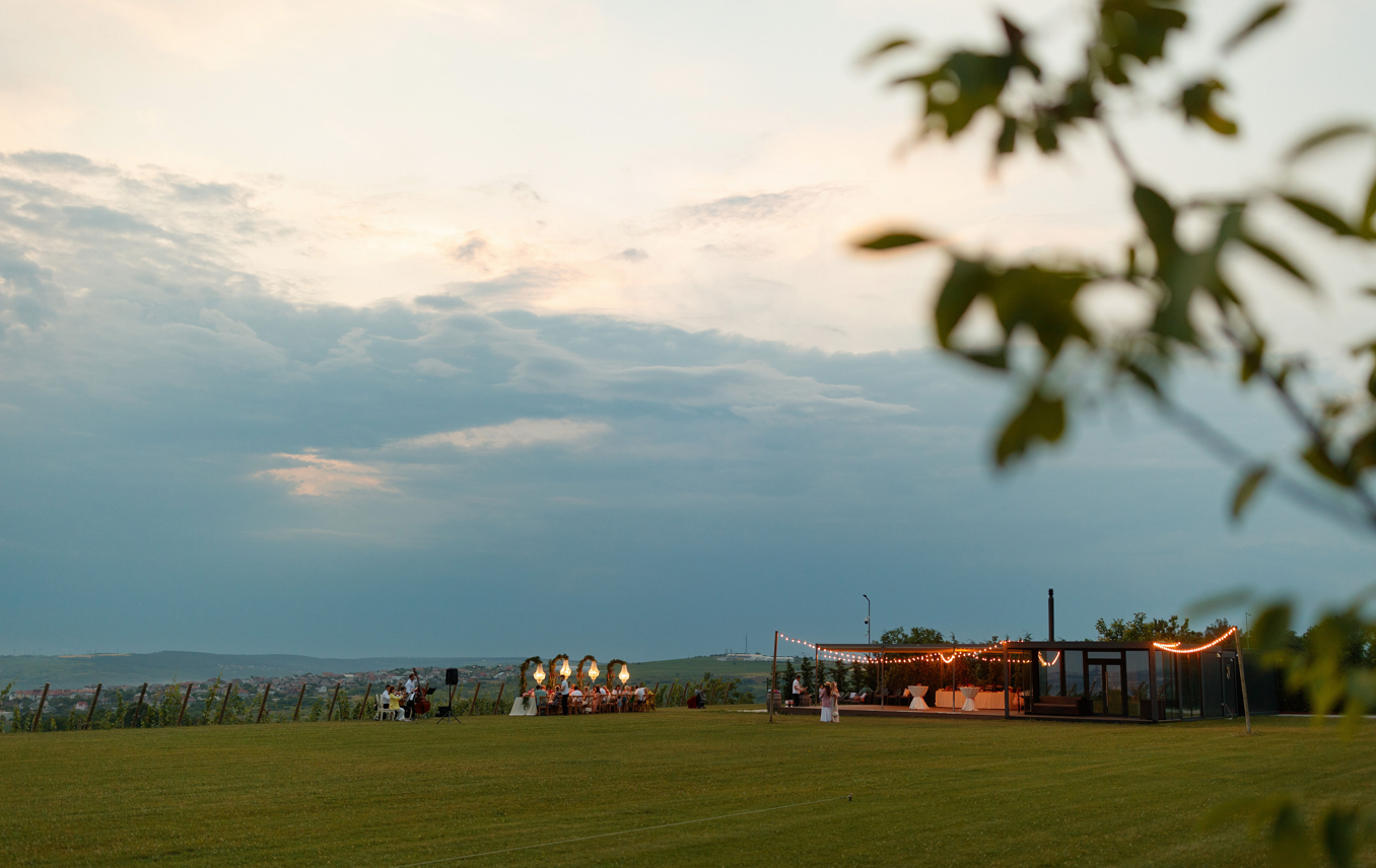 Rural venue with open-air setup at dusk in Moldova countryside