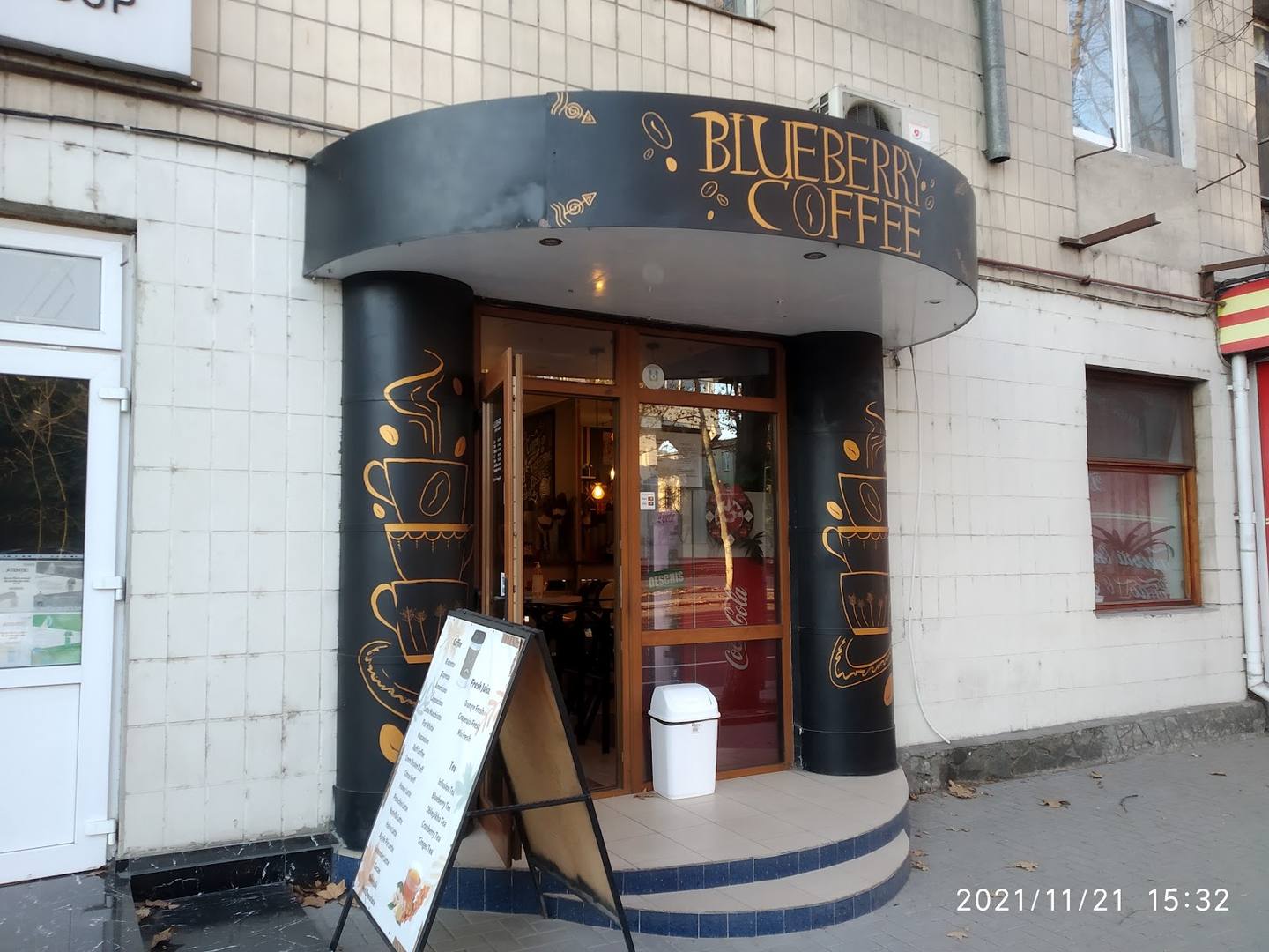 Bicerello Coffee storefront with signature curved dark awning and welcoming entrance
