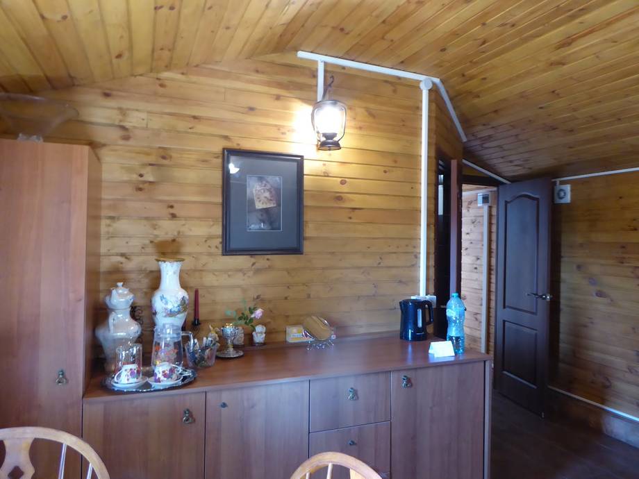 Rustic wooden interior with reception counter and spa products display