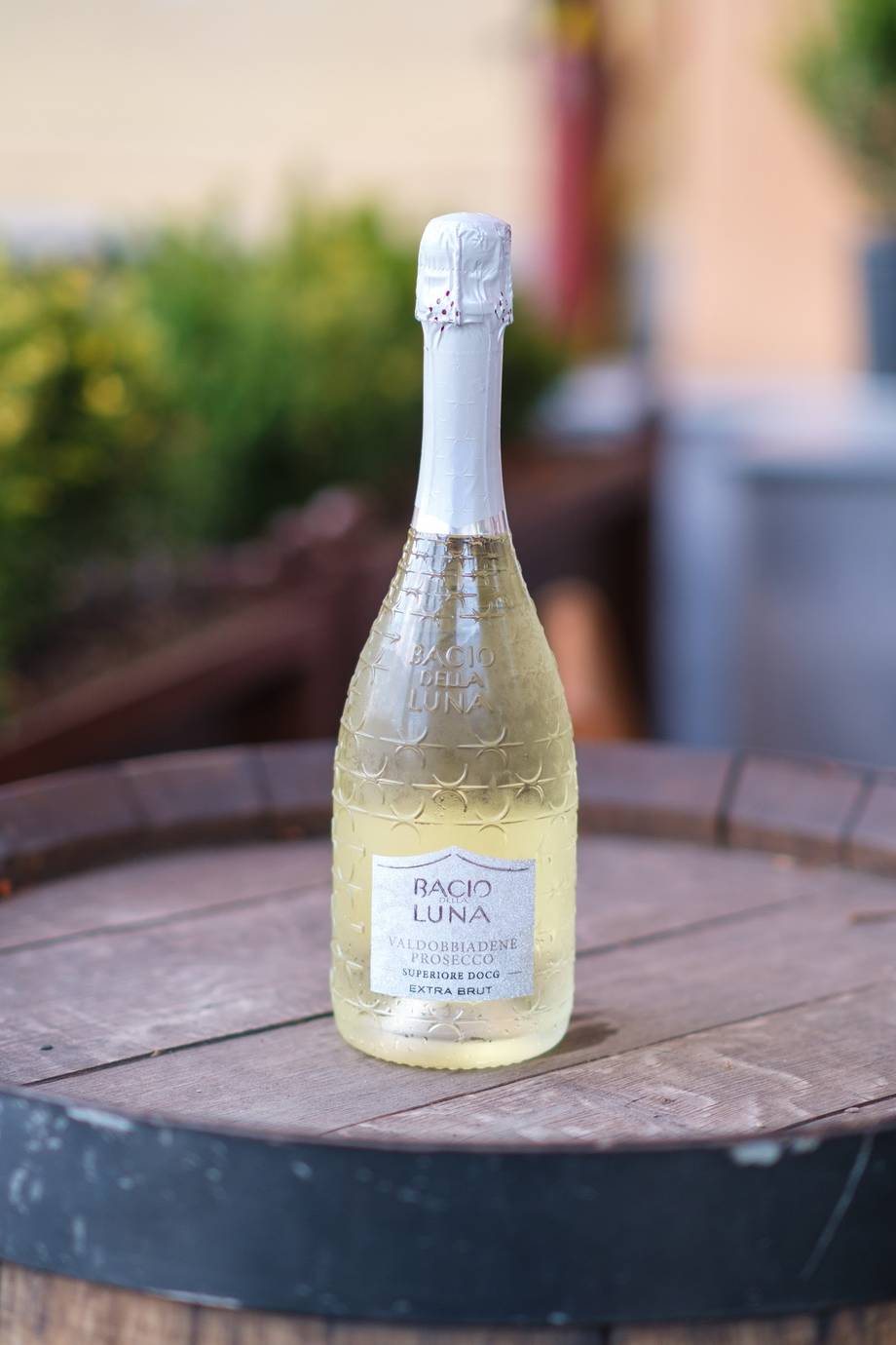 Racio Luna sparkling wine bottle on outdoor table setting