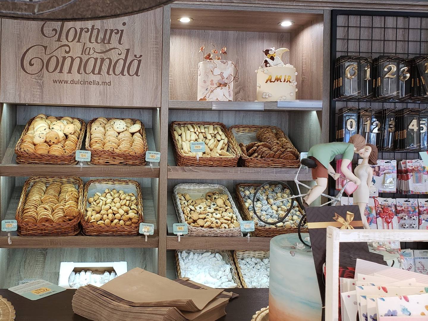Gloriuri din Comanda bakery display with artisanal pastries and decorated cakes