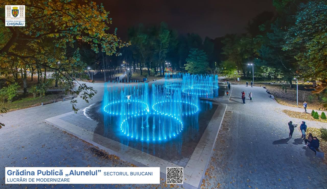 Gradina Publica Alhambra illuminated sculpture garden at dusk in Bucharest